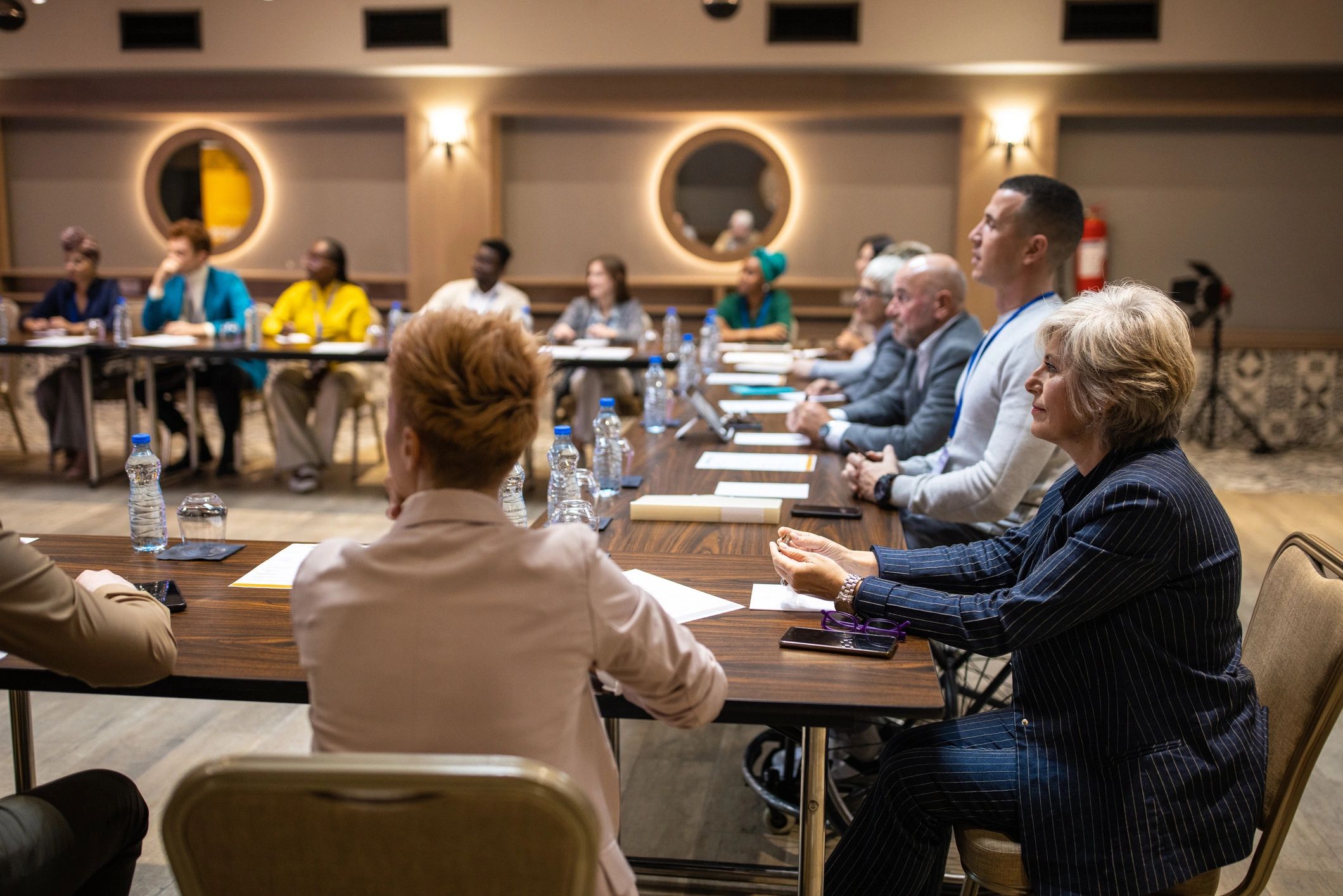Conference participants listening to a keynote session