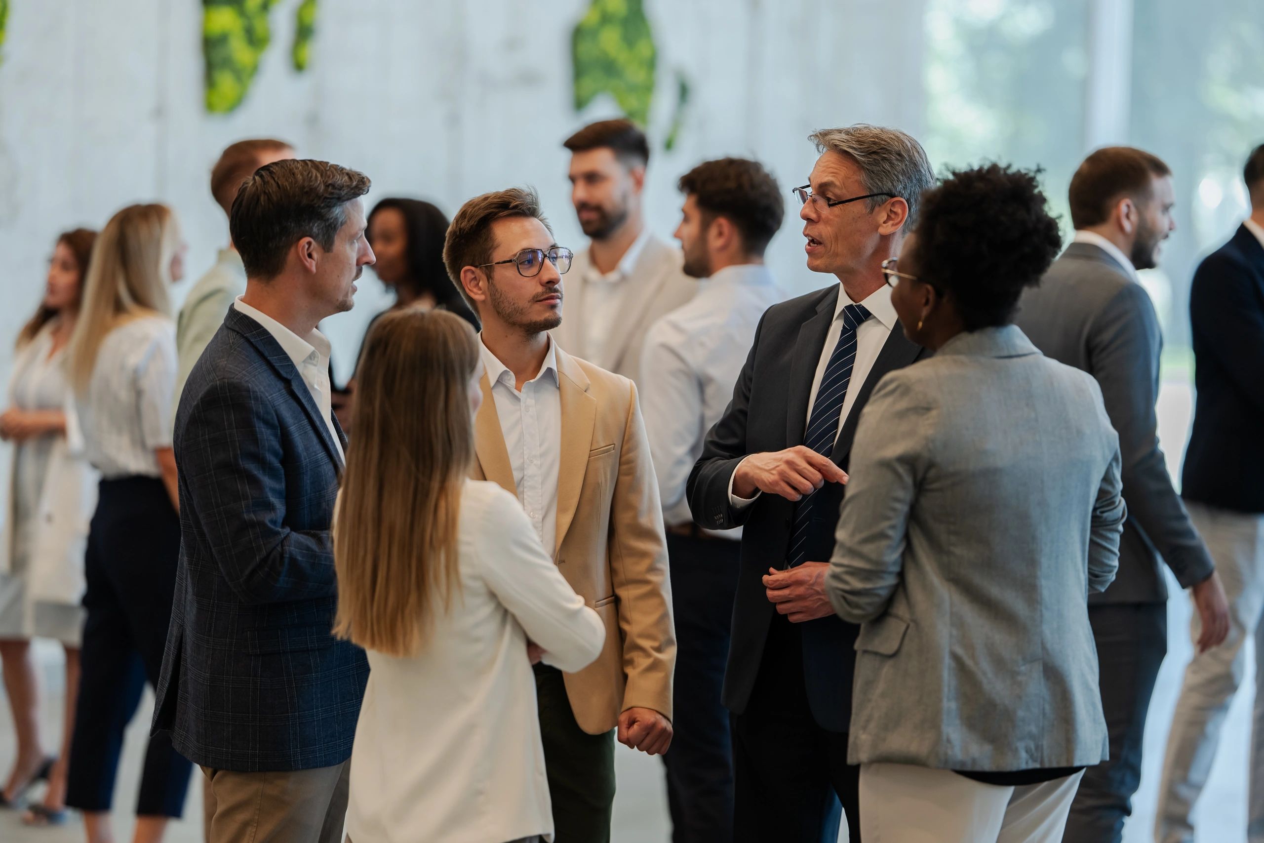 Business people networking and discussing during a conference event